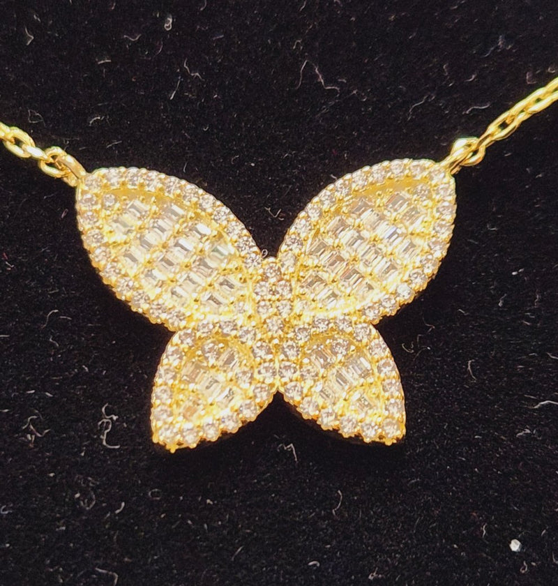 Gold butterfly with zircon