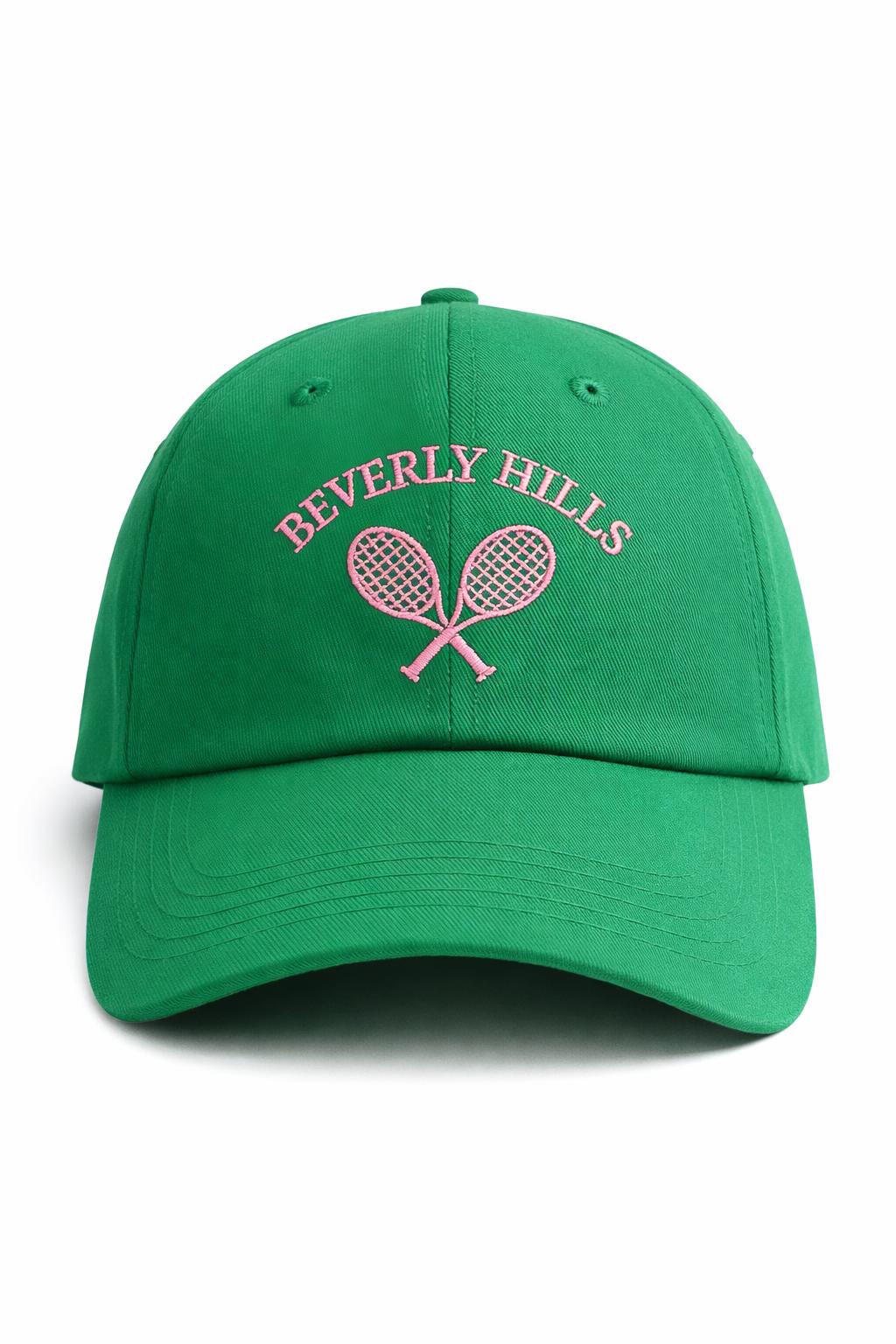 Green cap with 'Beverly Hills' and tennis racket design on a white background